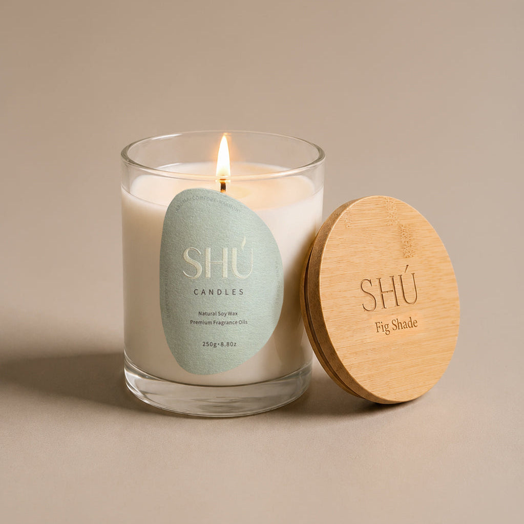 Fig Shade soy candle in clear glass with sage green label, SHU Candles