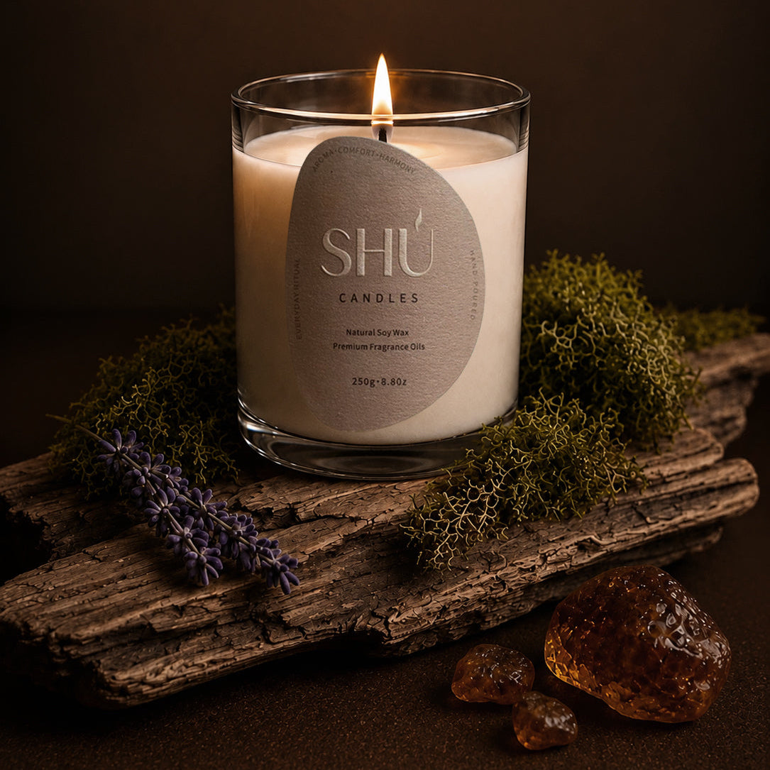 SHU Palo Santo candle burning, palo santo and sage scent
