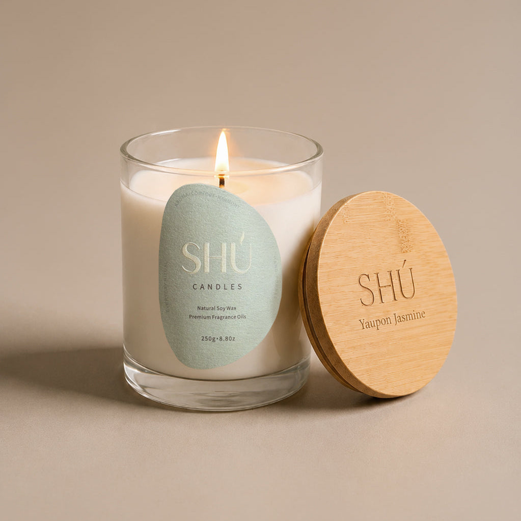 Yaupon Jasmine soy candle in clear glass with sage green label, SHU Candles